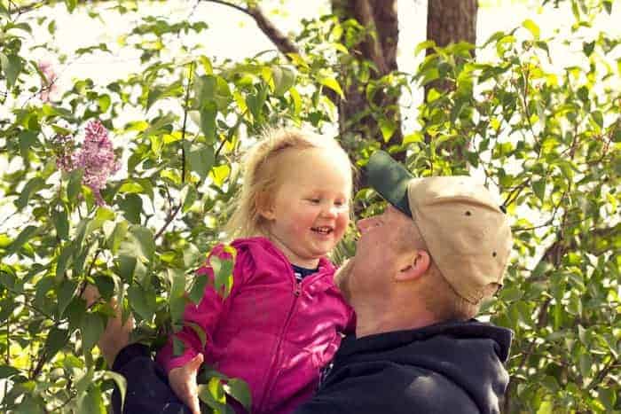 Baby laughing with daddy