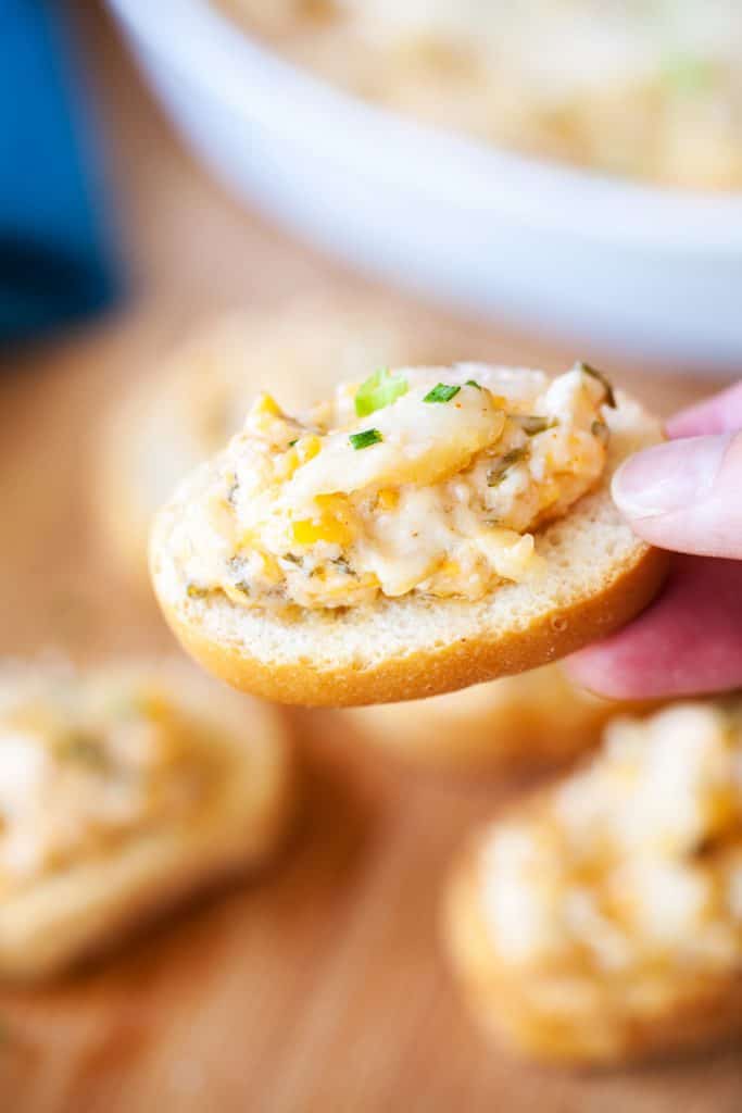 sliced crusty bread with hot dip[