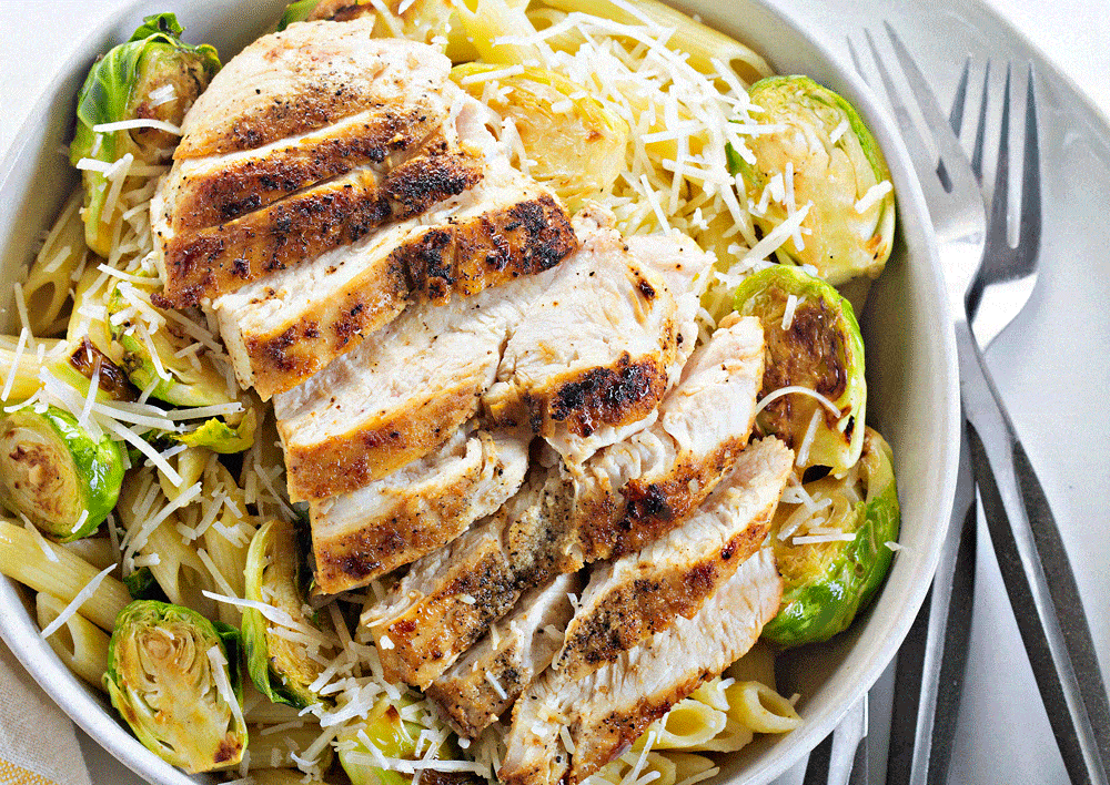 Garlic Chicken on a bed of pasta and brussel sprouts