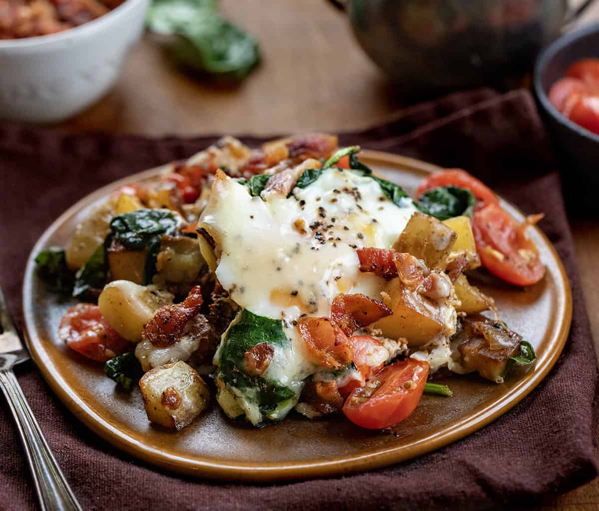 Plate of Breakfast Skillet Spinach and Eggs Plate of Breakfast Skillet Spinach and Eggs.