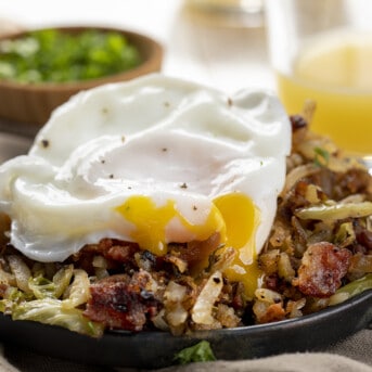 Brussels Sprouts Breakfast Hash on a Plate with Cut Into Egg. Breakfast, Hash, How to Make Hash, Poached Egg, How to Poach and Egg, breakfast recipes, i am homesteader, iamhomesteader.