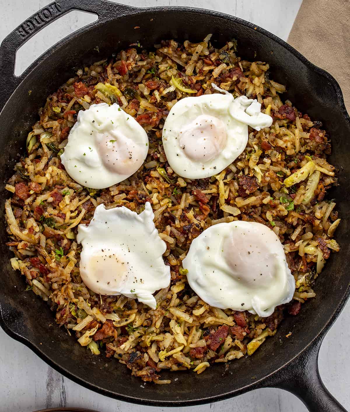 Skillet of Brussels Sprouts Breakfast Hash. Breakfast, Hash, How to Make Hash, Poached Egg, How to Poach and Egg, breakfast recipes, i am homesteader, iamhomesteader.