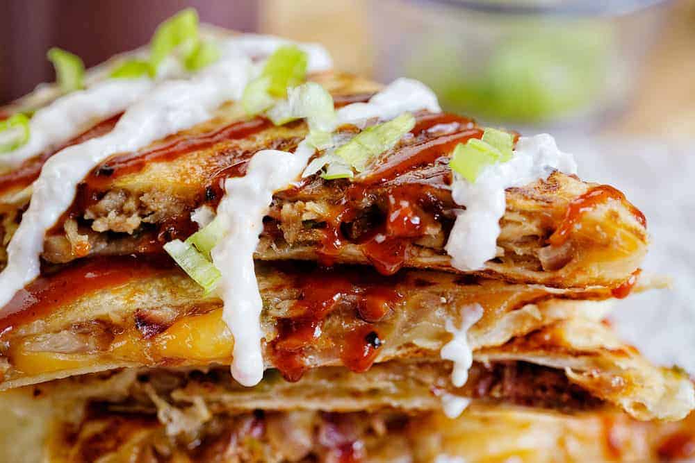 pulled pork quesadillas with bbq sauce and white sauce