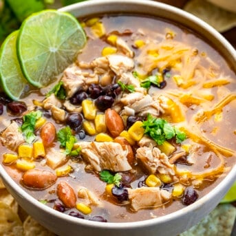 Bowl of 7 Can Chicken Taco Soup with Shredded Cheese and Lime Slices and Chips on the Side. Soup, Summer Soups, Easy Soups, Cheap Soup Recipes, Simple Soups, Chicken Taco Soup, Mexican Soup, Appetizer, Tortilla Chips, Thick Soups, Dinner, Chicken Recipes, recipes, i am homesteader, iamhomesteader