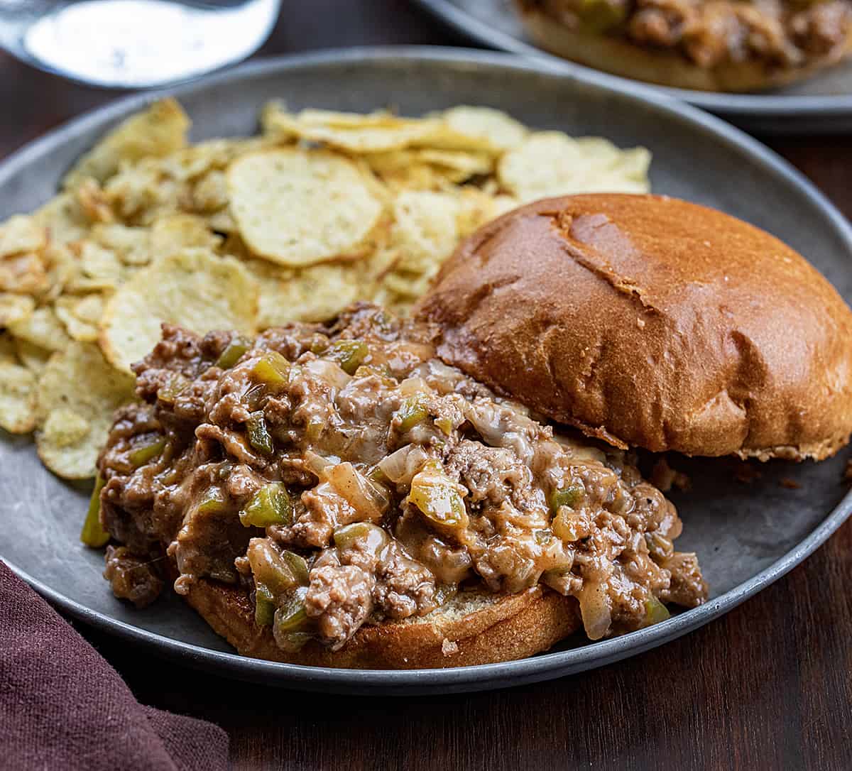 Philly Cheesesteak Sloppy Joe on a Plate with Chips.