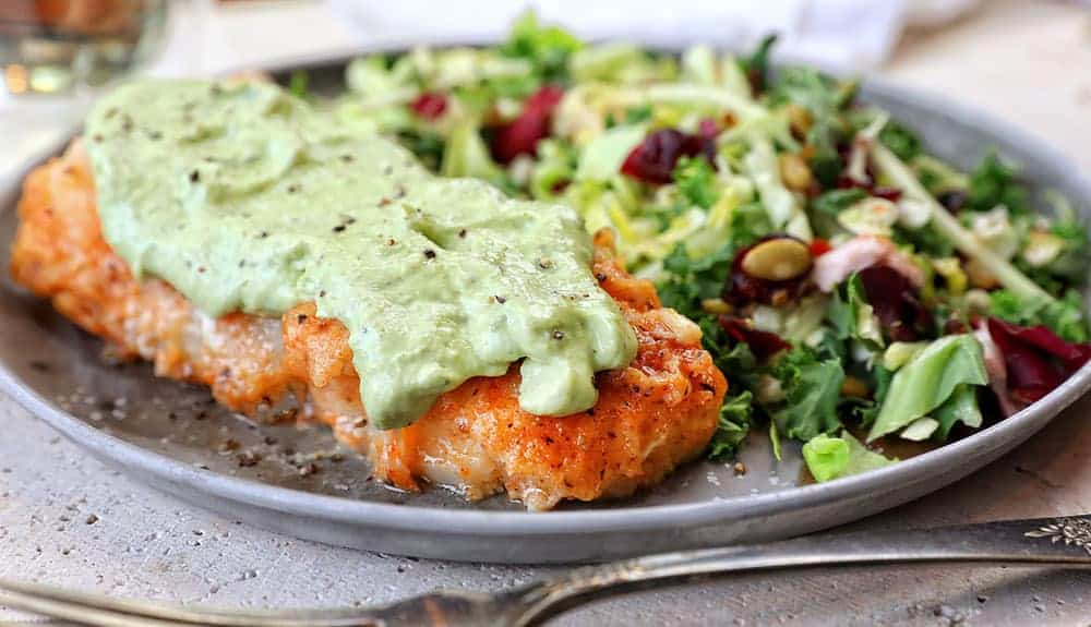 Pan Seared Cod smothered in a delicious avocado cream sauce