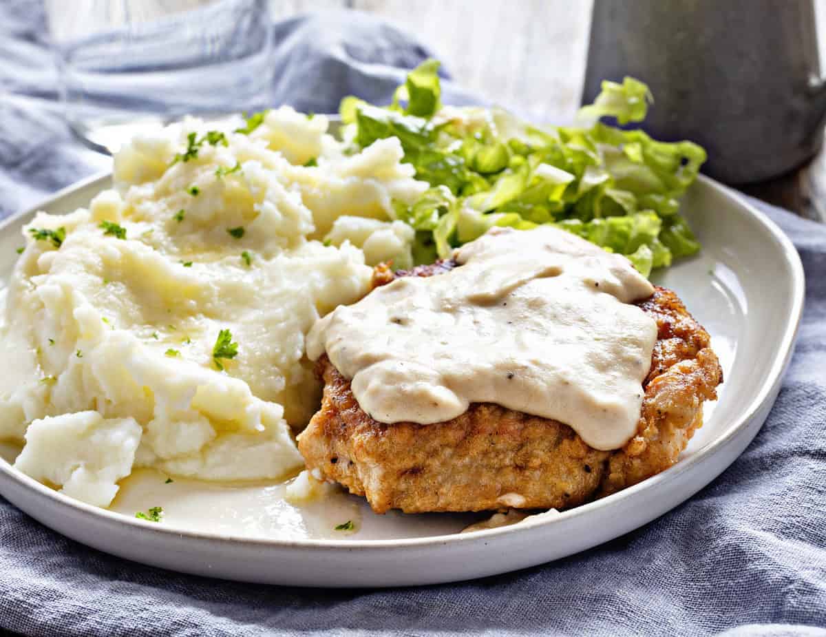 Country Fried Pork Chop on Plate with Gravy