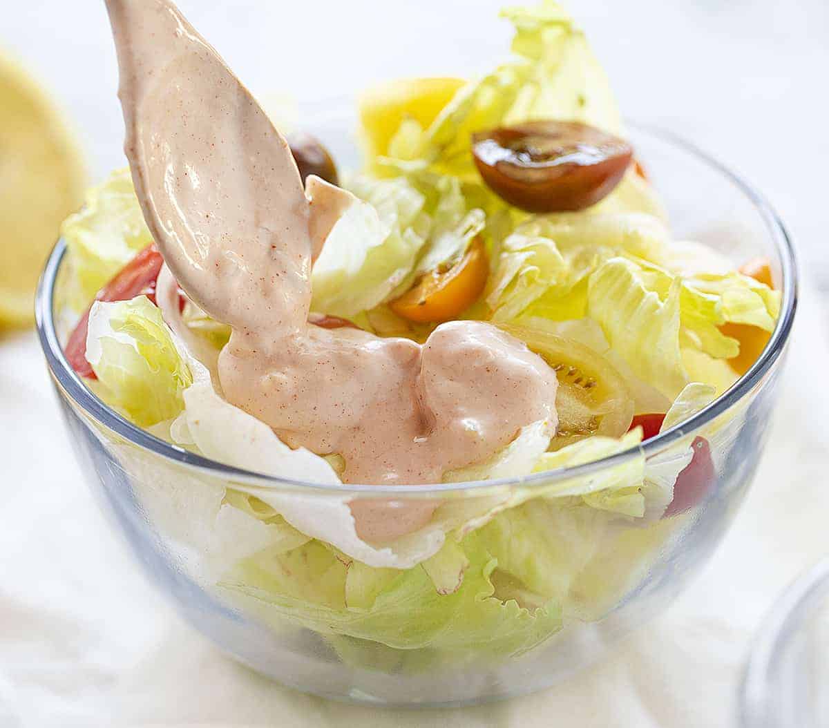 Thousand Island Dressing over a lettuce salad