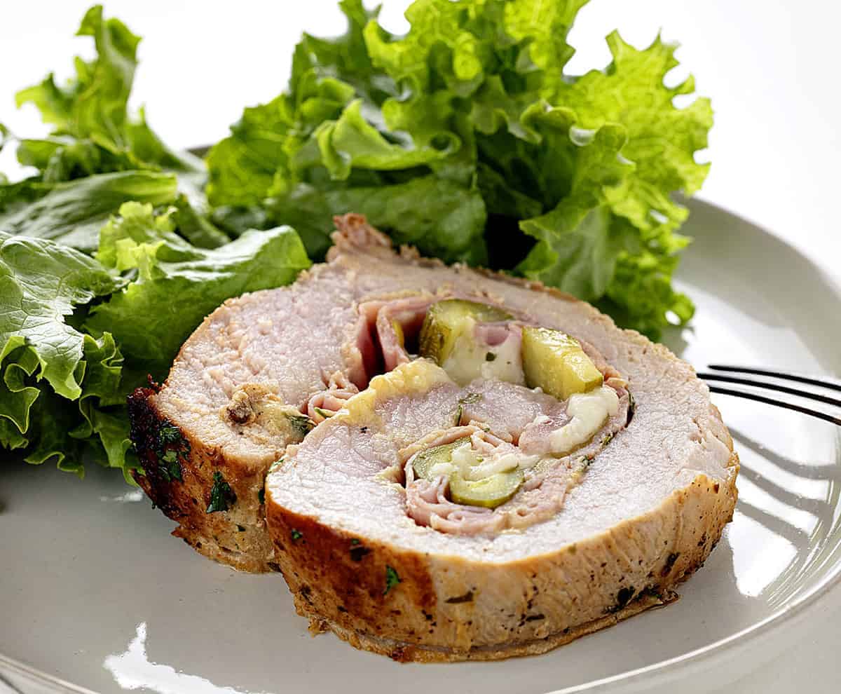 Slice of Cuban Pork Loin on a Plate with lettuce