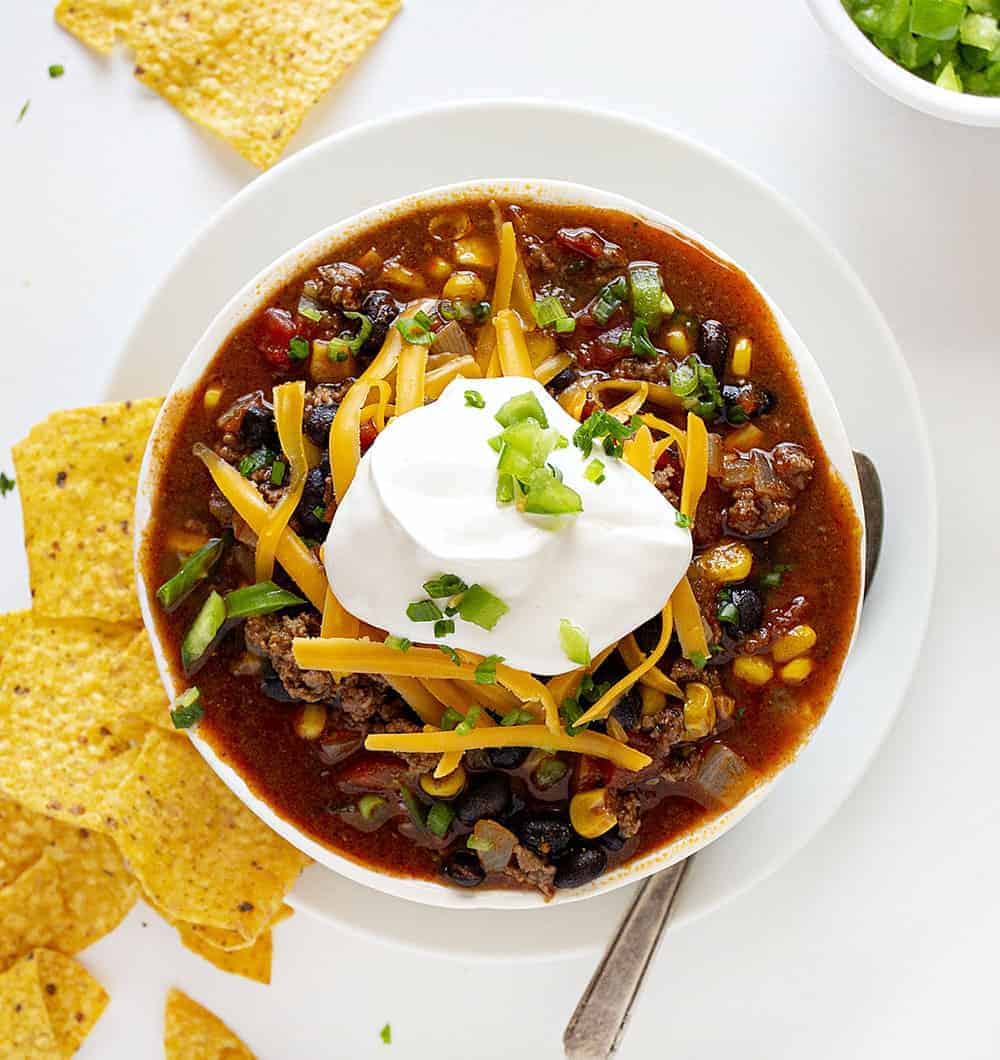 Overhead Bowl of Taco Chili with Sour Cream and Jalapenos