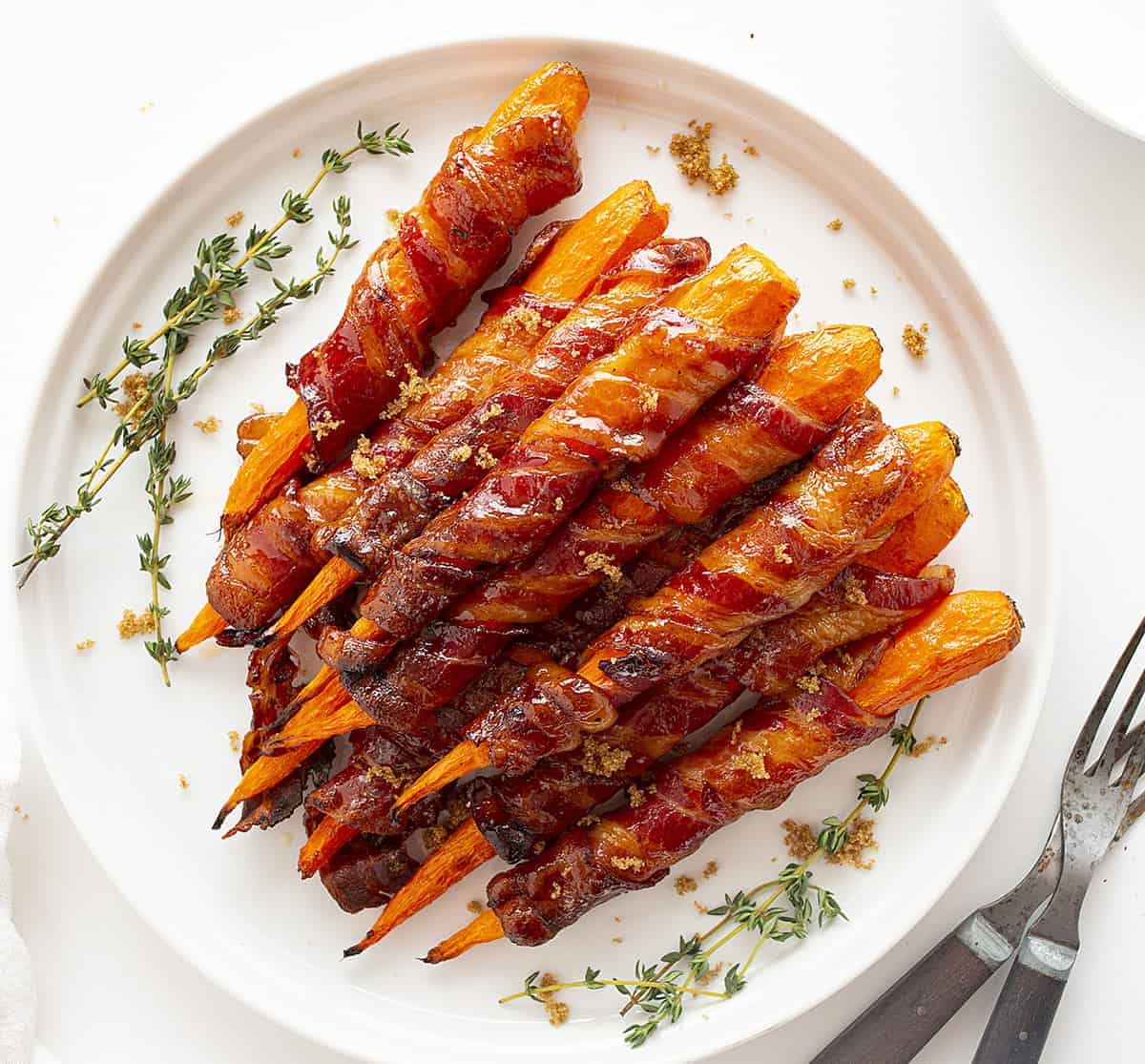 Overhead view of Maple Bacon Carrots on White Plate