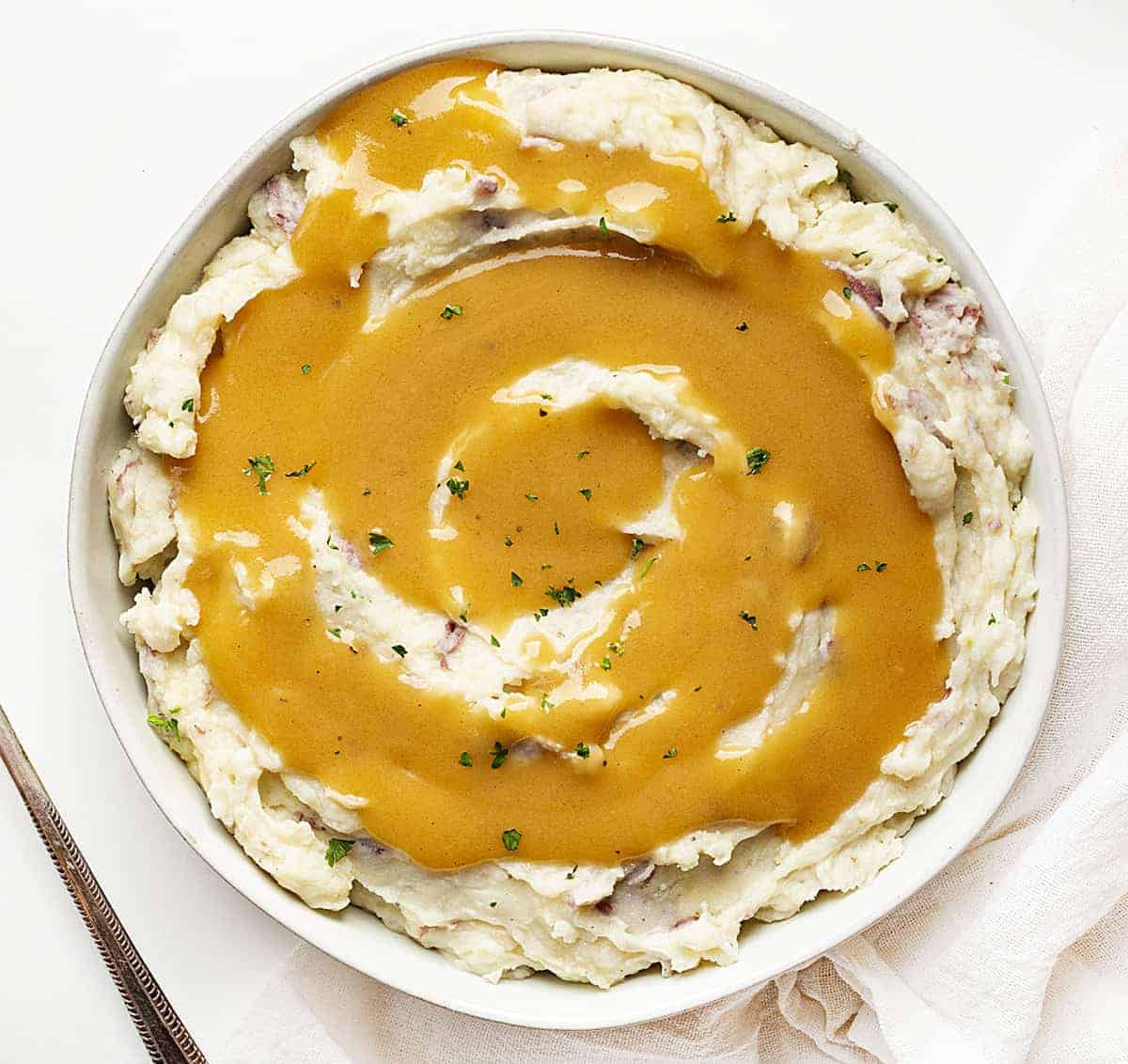 Bowl of Skins On Mashed Potatoes with Gravy
