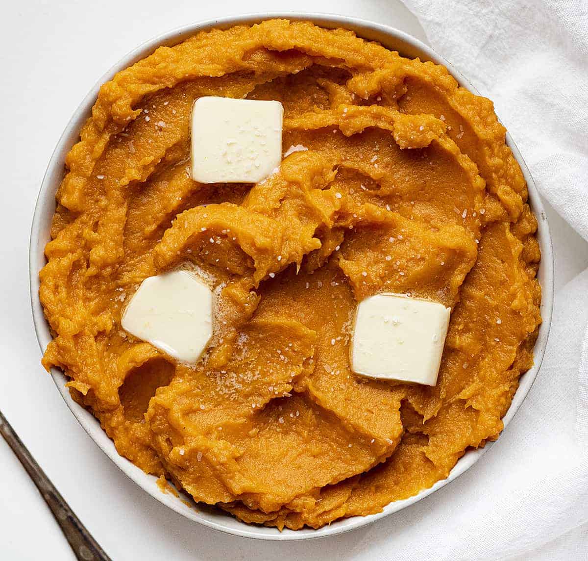 Bowl of Mashed Sweet Potatoes with Butter