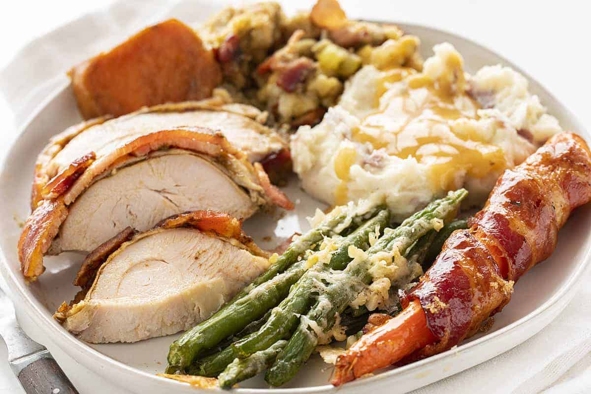 PLate of Thanksgiving fixings with Roasted Green Beans