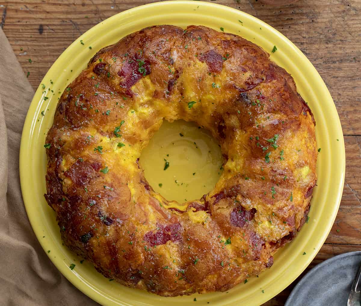 Breakfast Monkey Bread from Overhead on a Yellow Plate. Breakfast, Breakfast Recipes, Easy Breakfast Idea, Monkey Bread, Breakfast for a Crowd, Holiday Breakfast Ideas, Savory Bread, Baking, recipes, i am homesteader, iamhomesteader