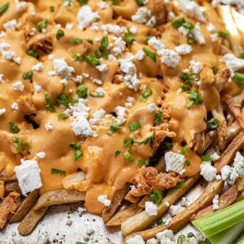 Buffalo Chicken Cheesy Fries with Celery. Appetizer, Super Bowl Food, Football Recipes, Cheesy Fries, Buffalo Chicken Recipes, Buffalo Chicken Sauce, i am homesteader, iamhomesteader