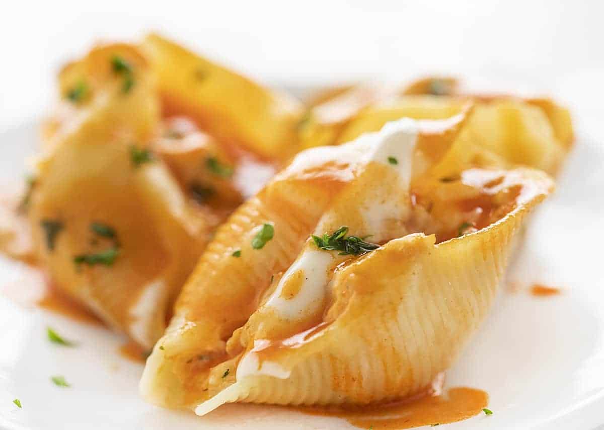 Buffalo Chicken Stuffed Shells on a White Plate