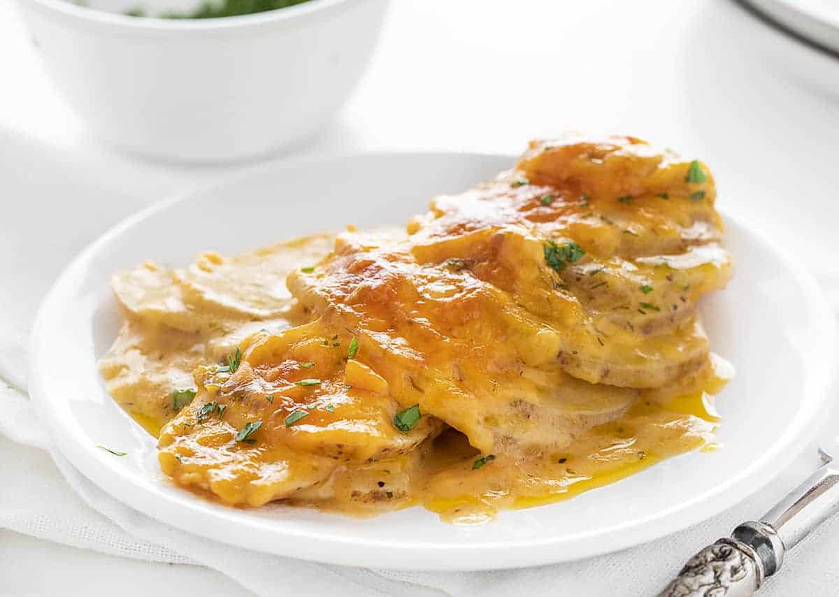 Plate of Scalloped Potatoes with Cheesy Ranch Sauce