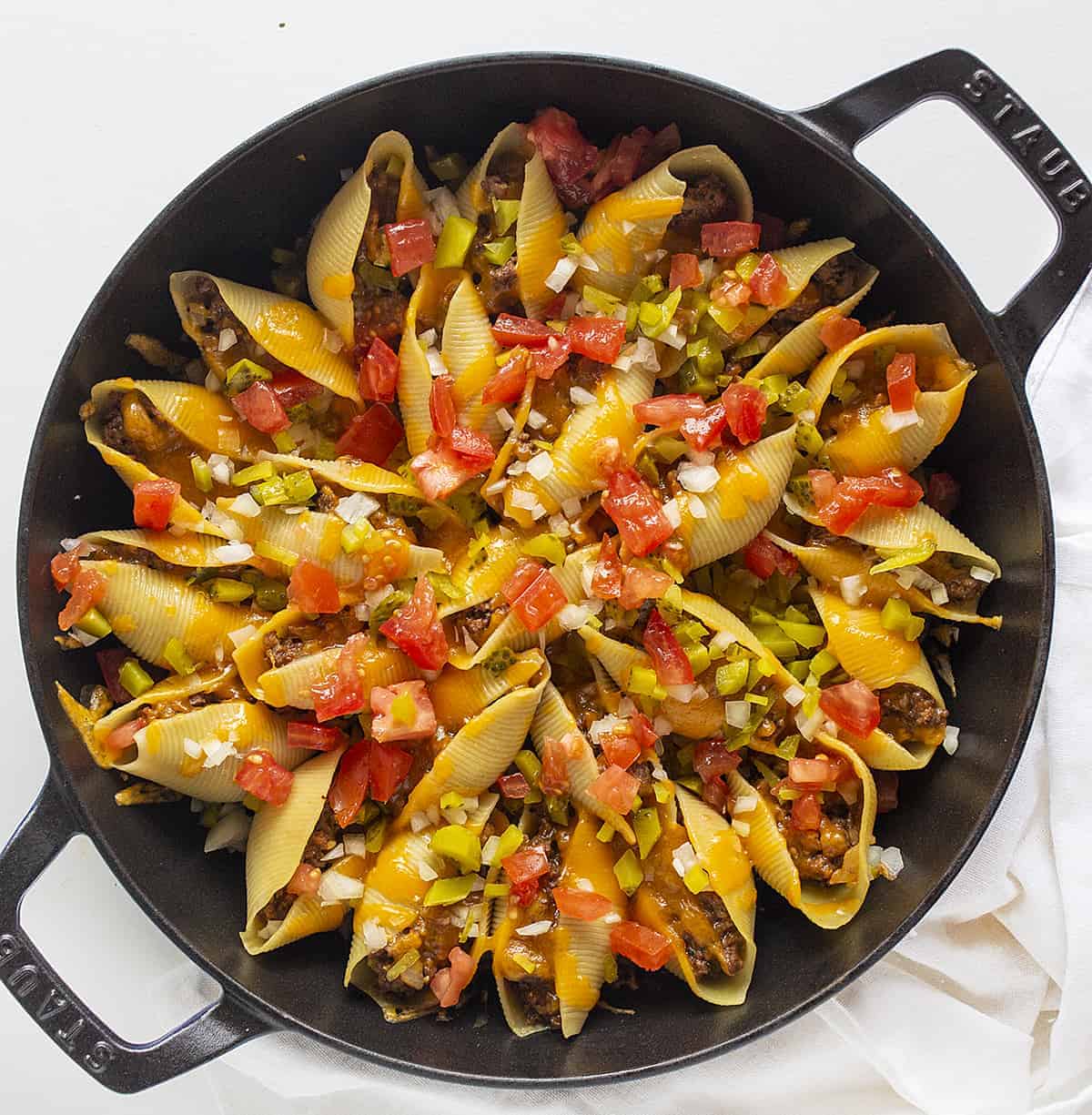 Cheeseburger Stuffed Shells Overhead Picture in a Skillet