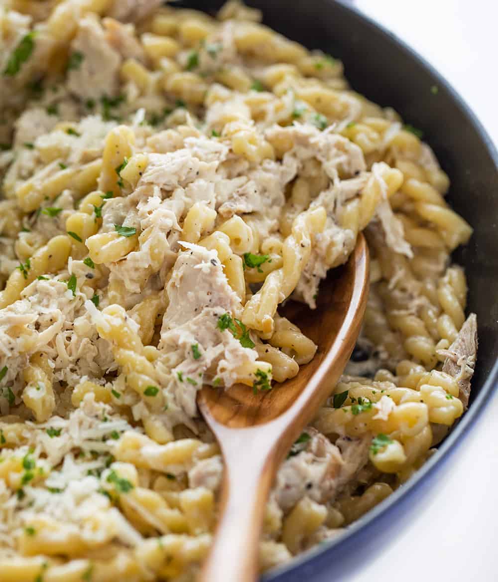 Easy Lemon Chicken Pasta in a Skillet with Wooden Spoon