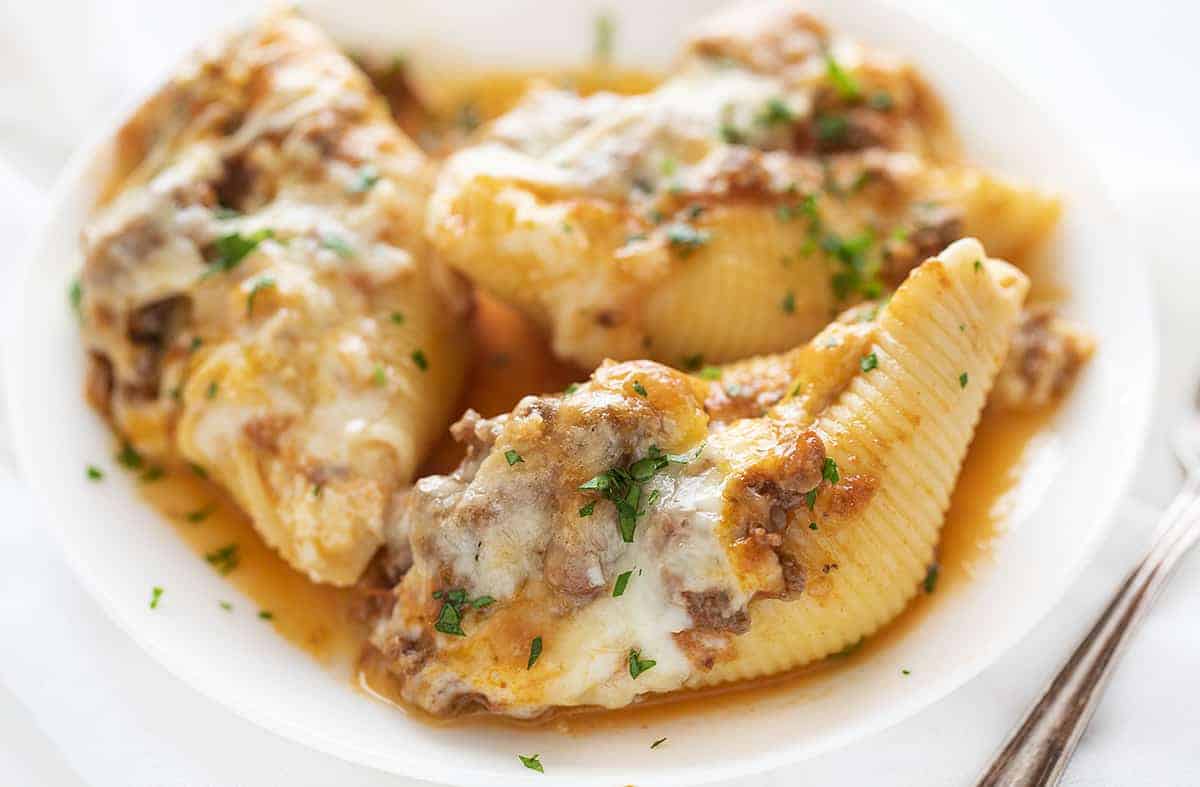 Three Cheese Stuffed Shells on A White Plate