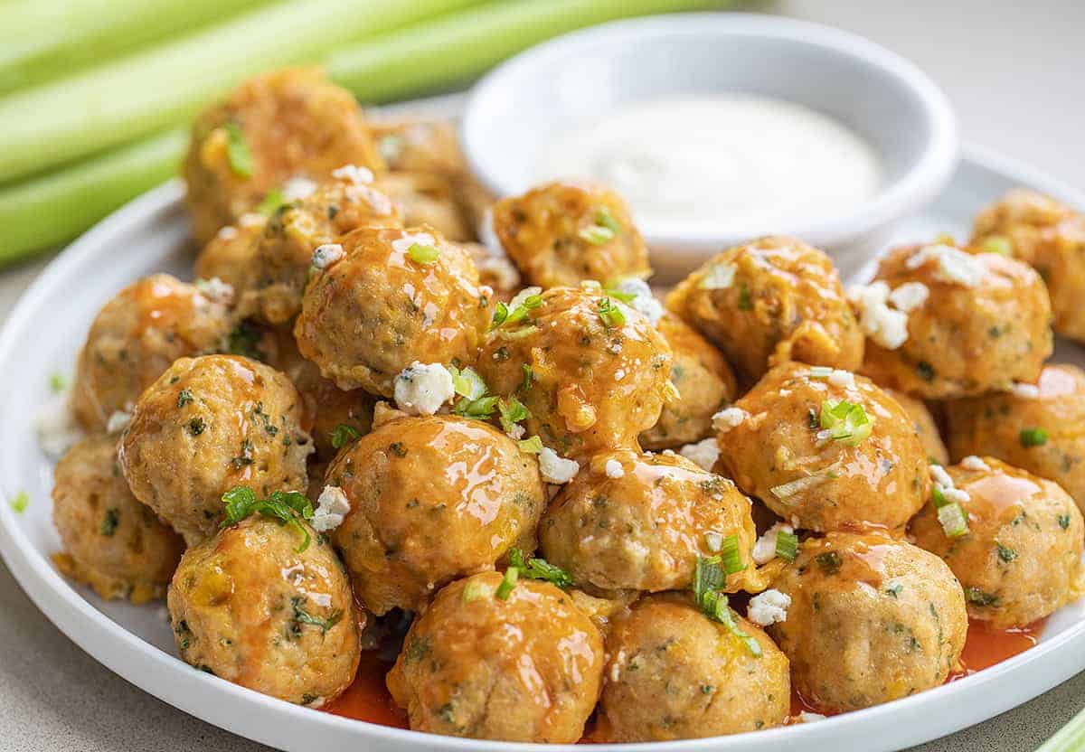 Plate of Buffalo Chicken Meatballs with Ranch and Celery