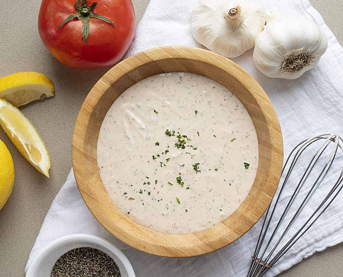 Overhead view of a Bowl of Aioli Recipe with some raw ingredients