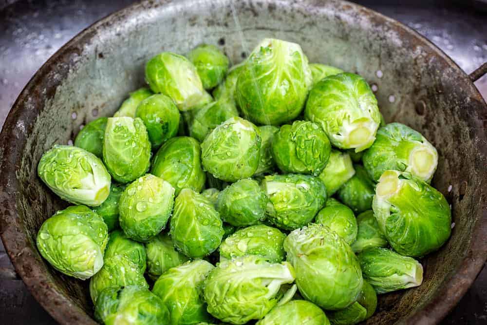 Freshly Washed Brussels Sprouts in Strainer