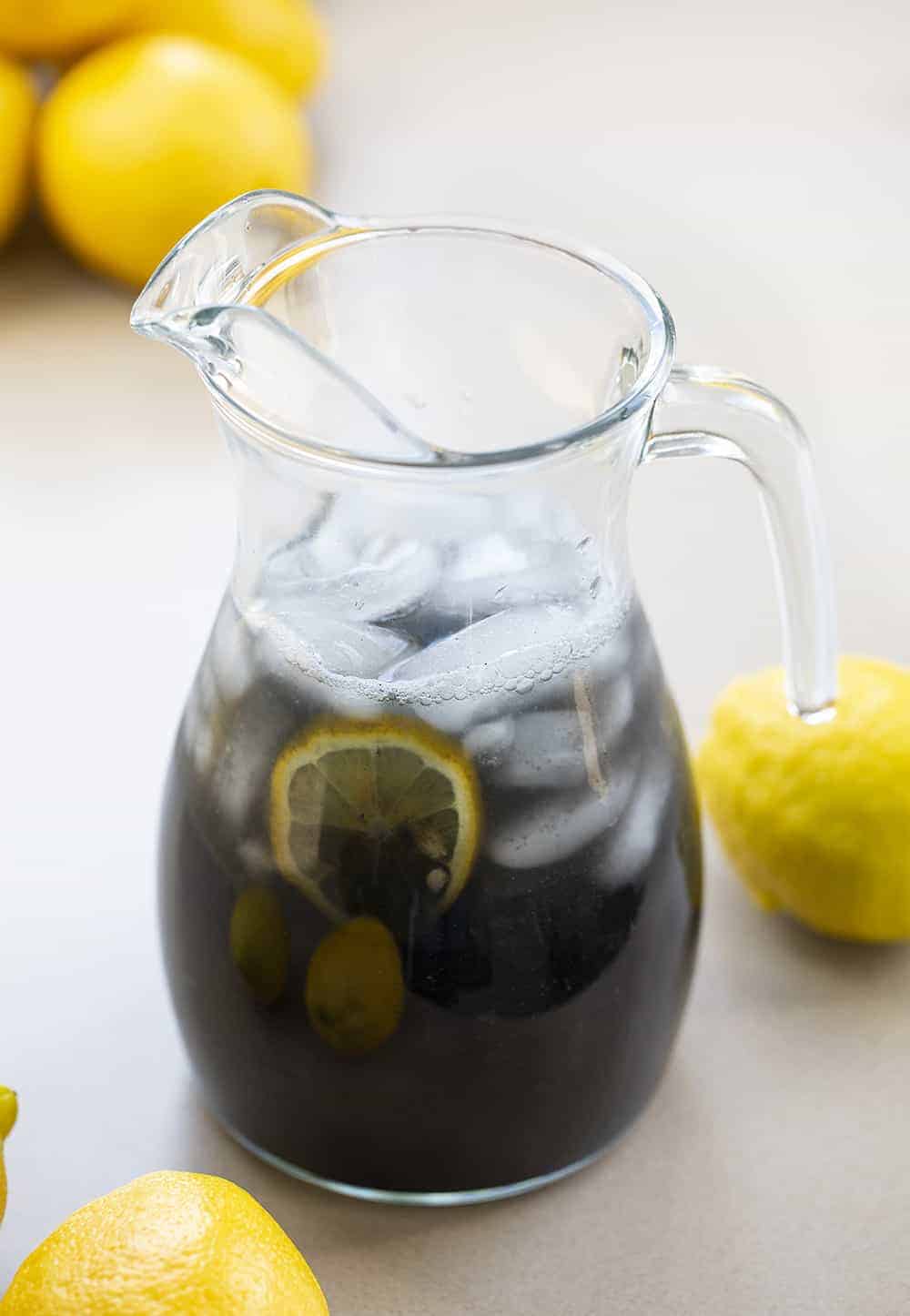 Pitcher of Charcoal Lemonade with Lemons