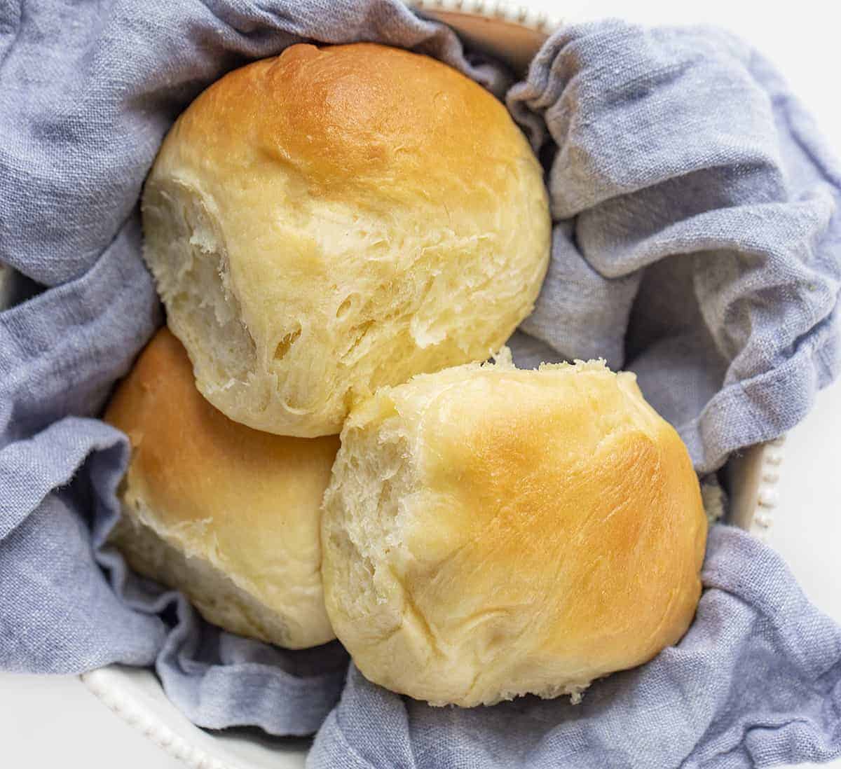 Texas Roadhouse Rolls Shot from Overhead on a Blue Towel in a Bowl