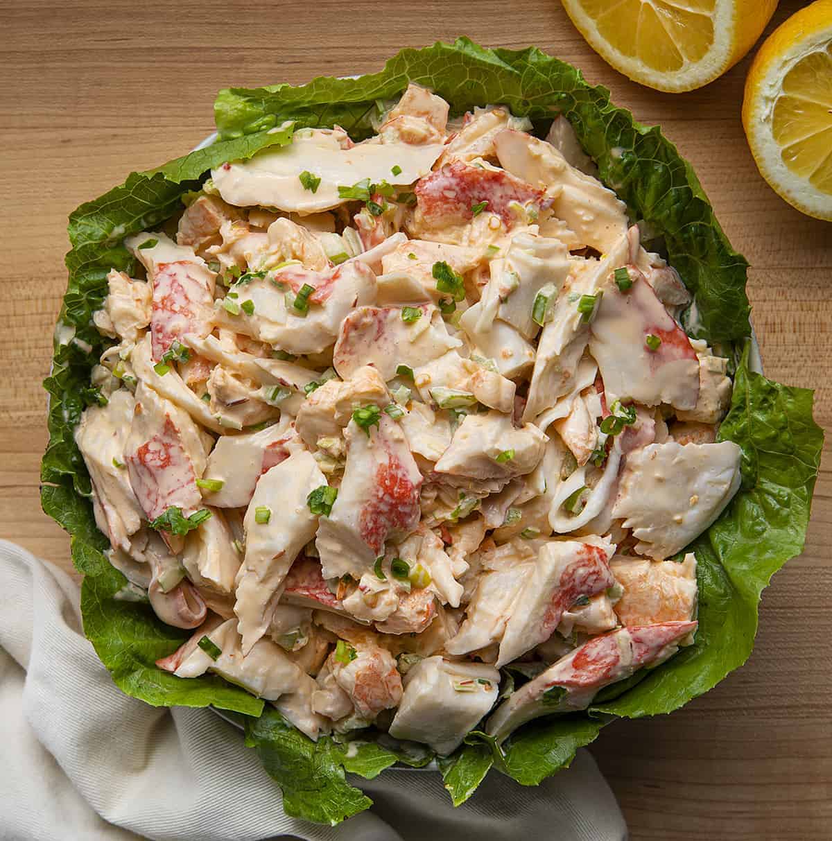 Overhead View of Crab Louis in a Bowl with Lettuce and Towel Near By