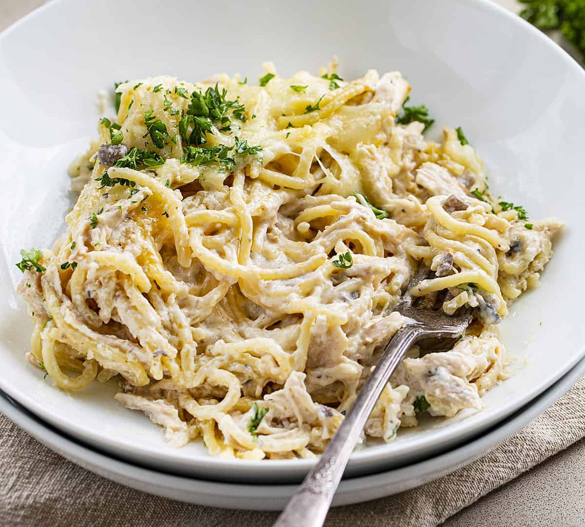 Bowl of Creamy Chicken Tetrazzini with Fork