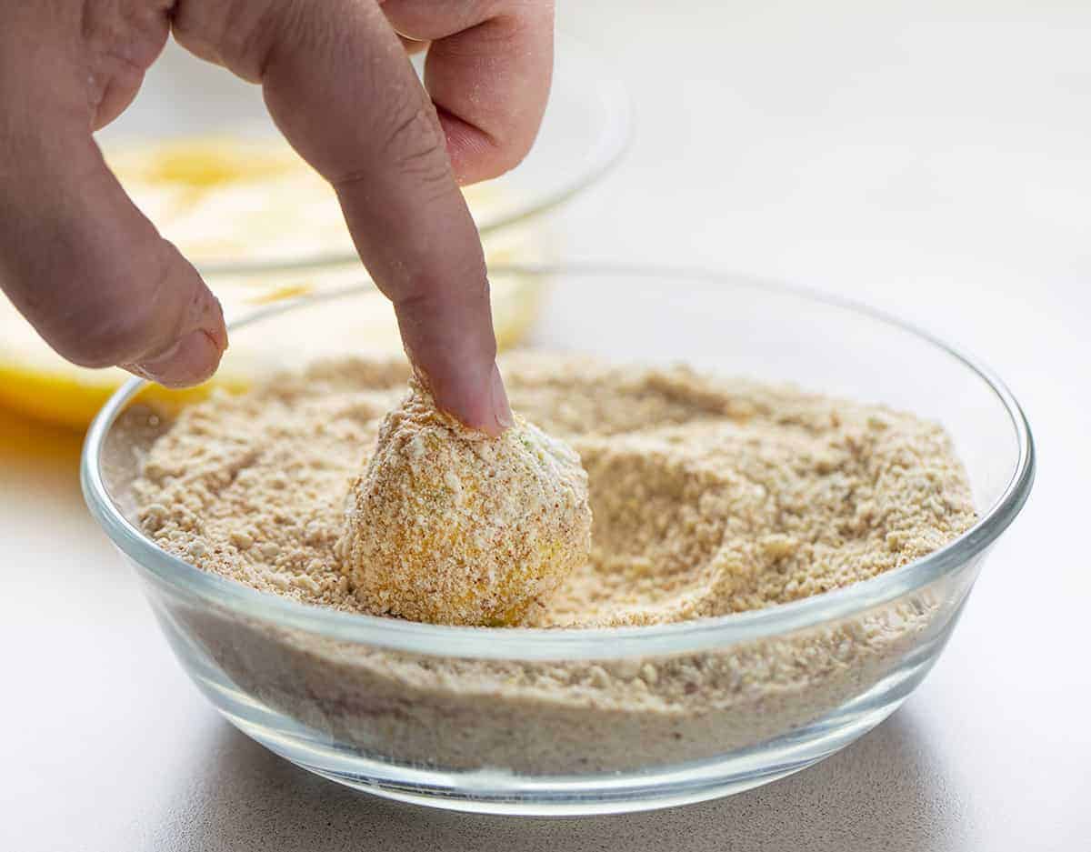 Rolling Ingredients for Jalapeno Popper Bites in Breadcrumbs