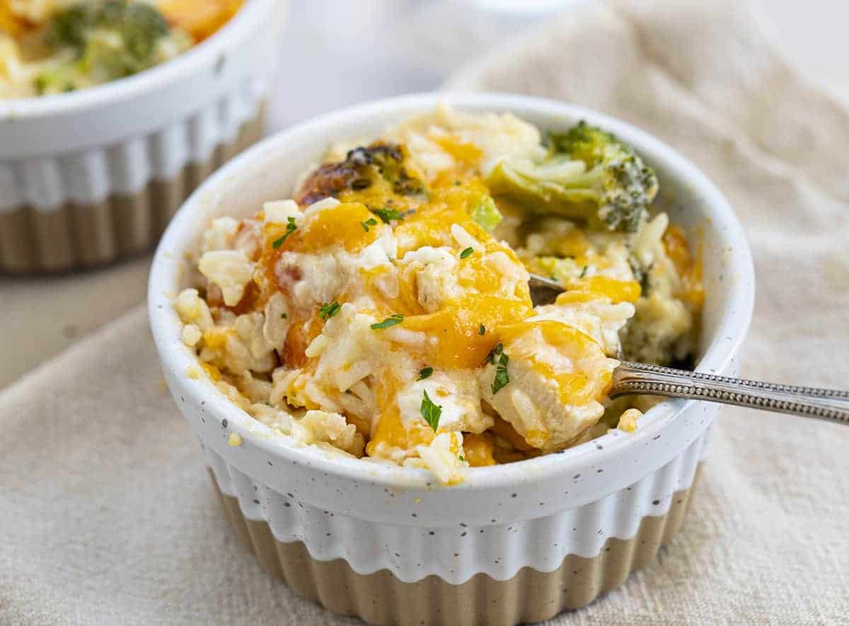 Two Bowls of Chicken Rice Casserole with a Spoon