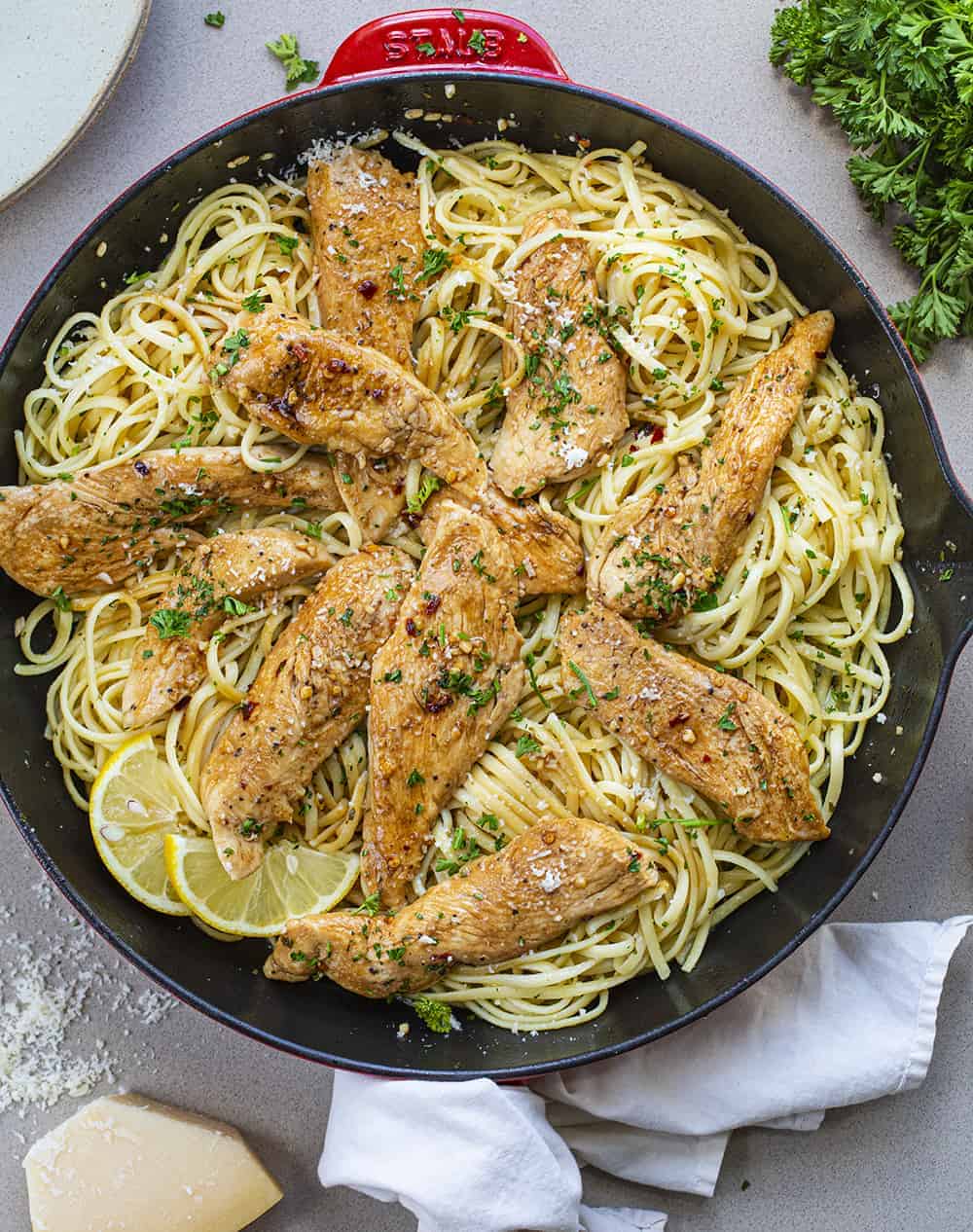 Chicken Scampi Linguini in a Red Skillet Shot from Overhead