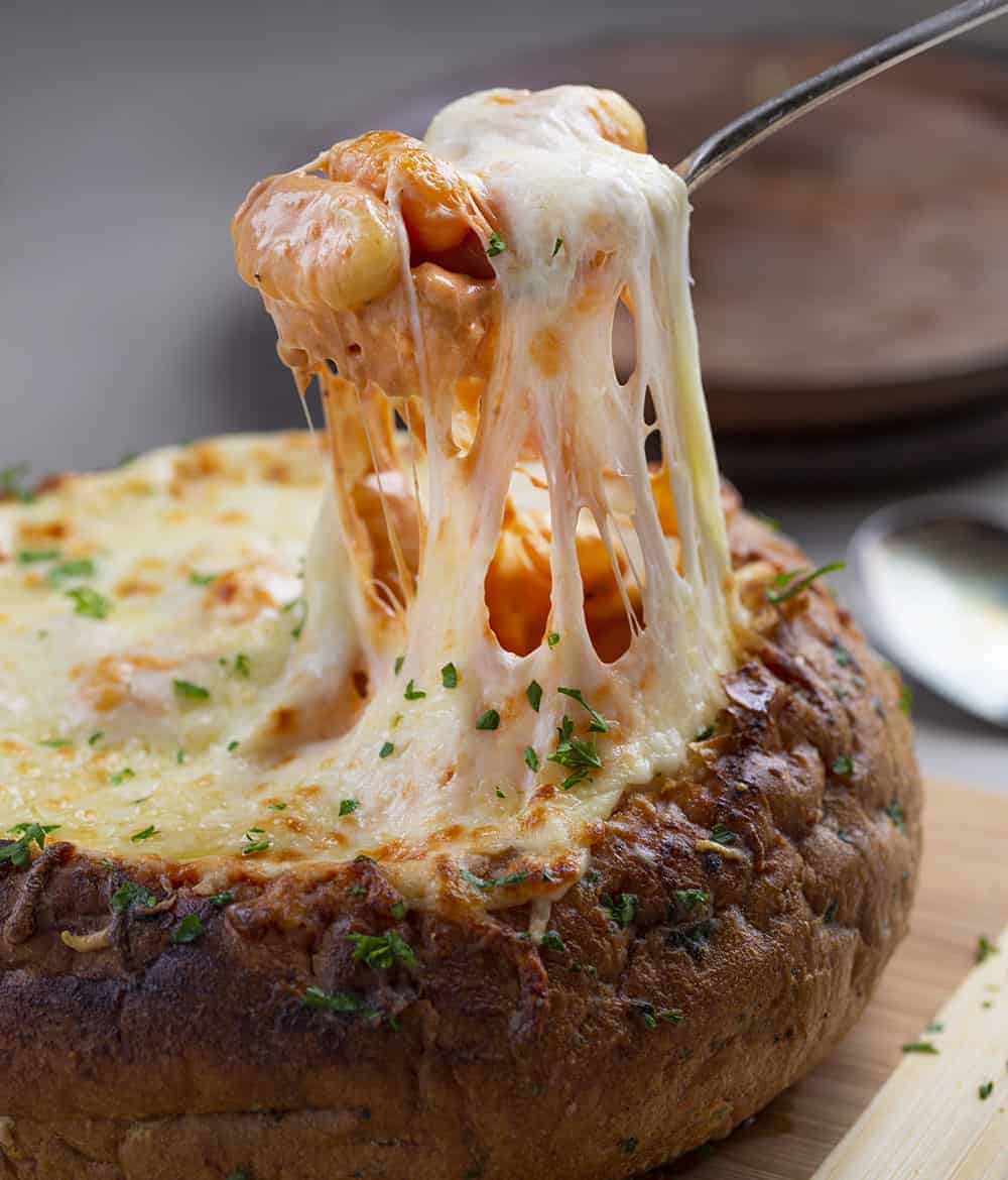 Spicy Gnocchi Bread Bowl with Cheese Stretched