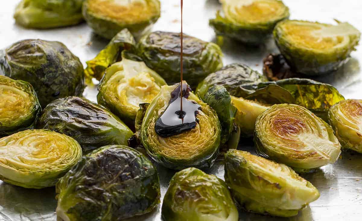 Adding Balsamic to Balsamic Cranberry Roasted Brussels Sprouts