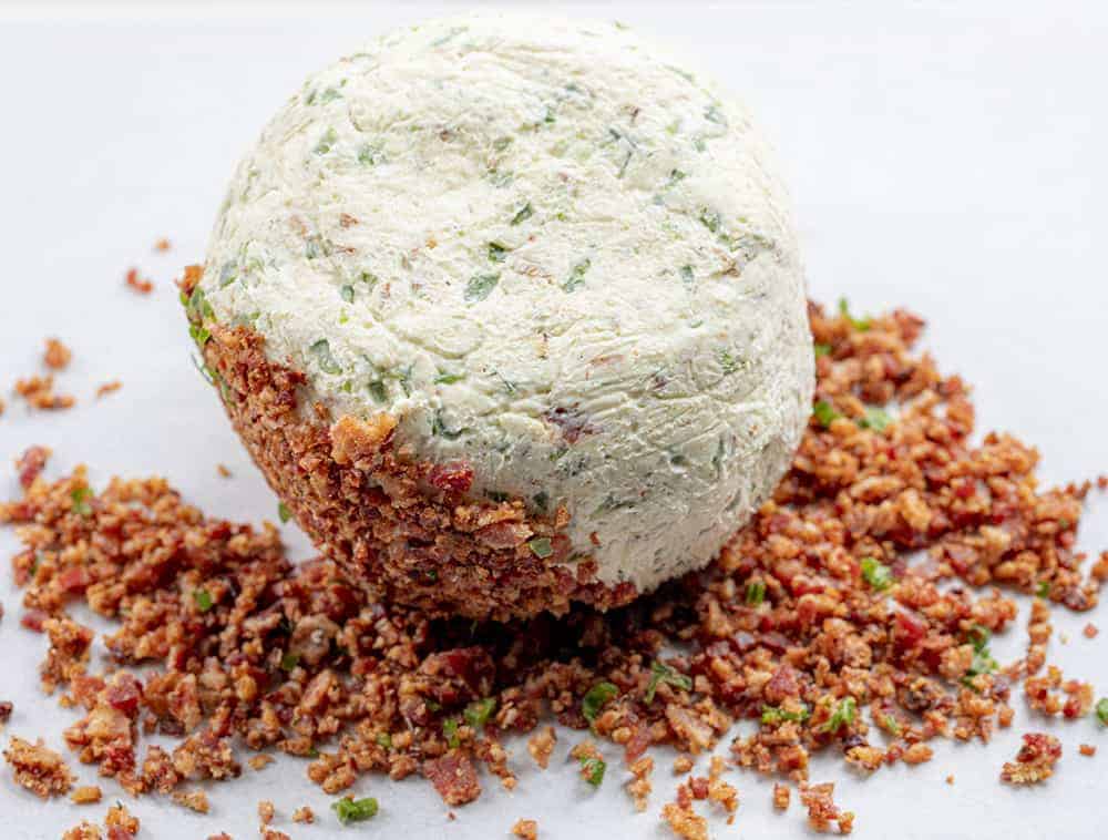 Rolling Cheeseball in Bacon and Jalapeno
