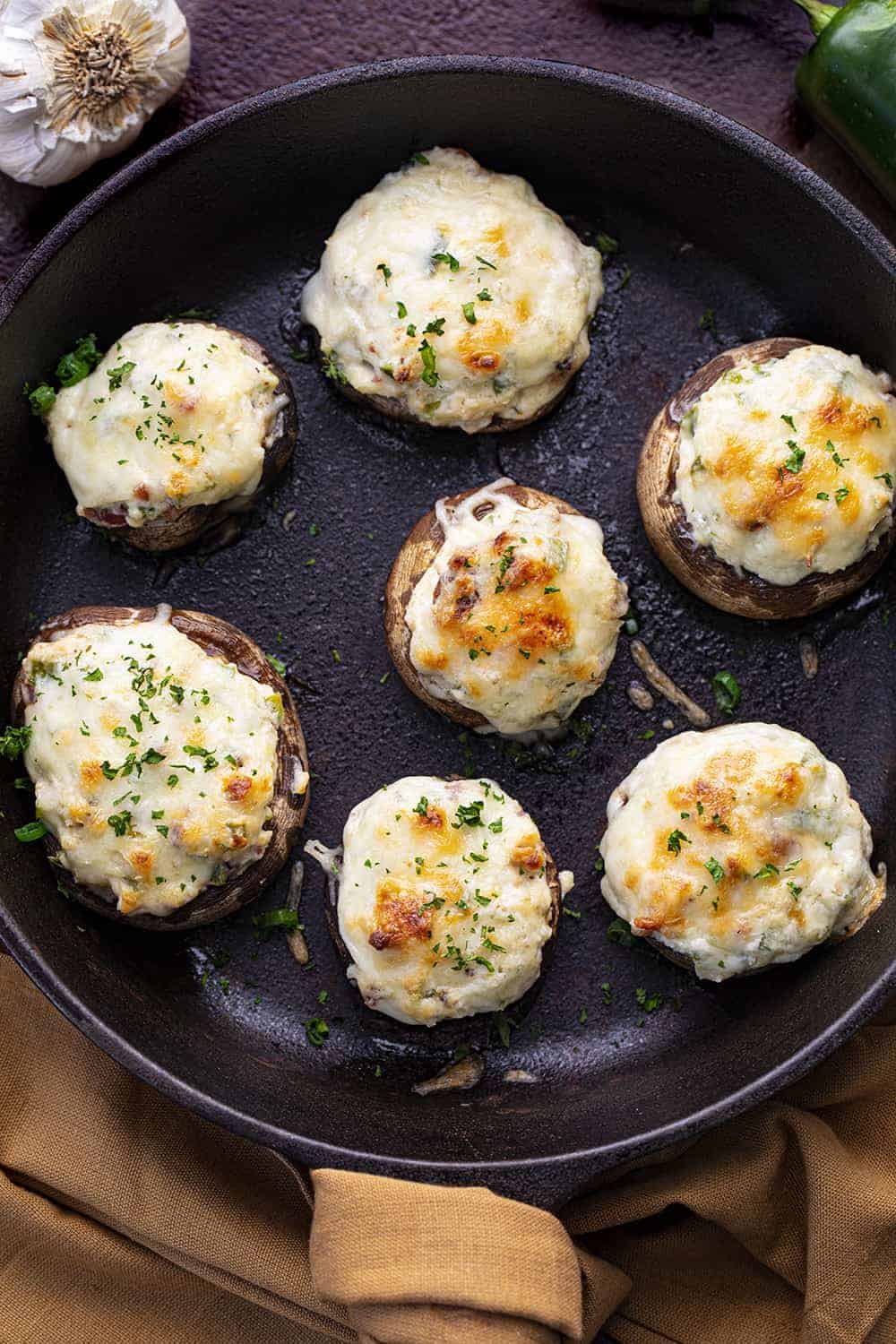 Overhead of Jalapeno Popper Stuffed Mushrooms in Skillet