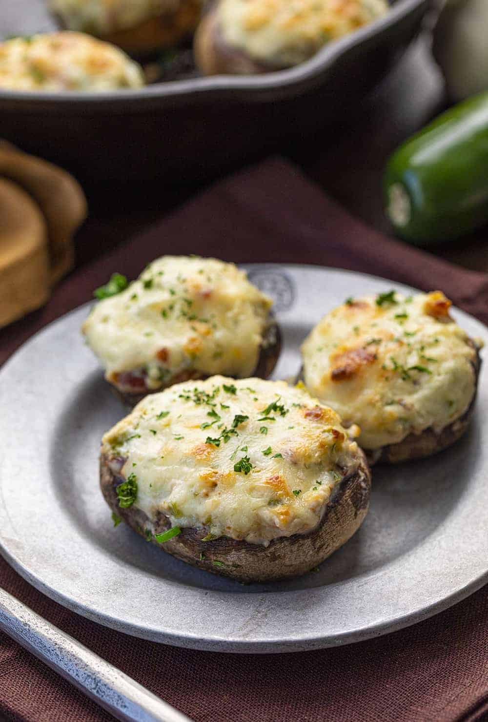 Plate with Jalapeno Popper Stuffed Mushrooms on It