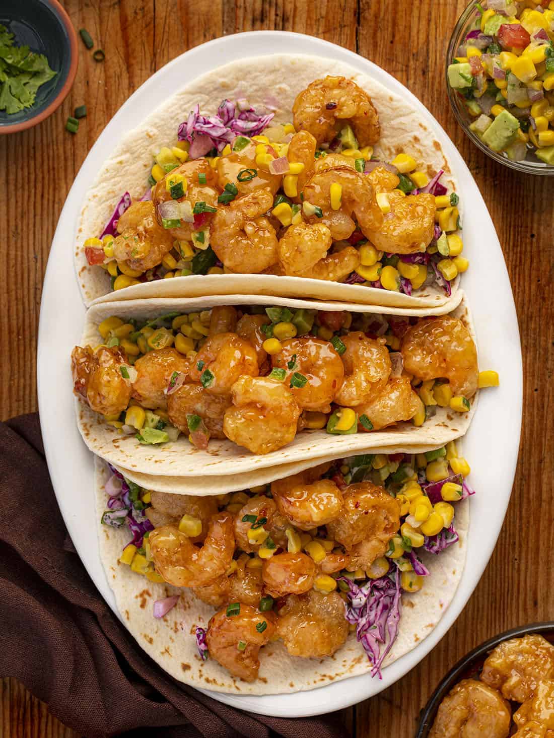 Overhead of Three Bang Bang Shrimp Tacos