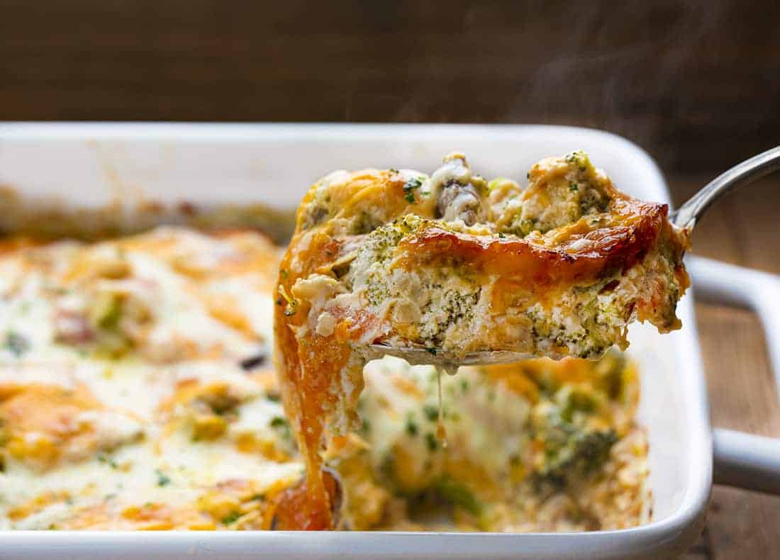 Spoon Picking Up Broccoli Cheese Casserole