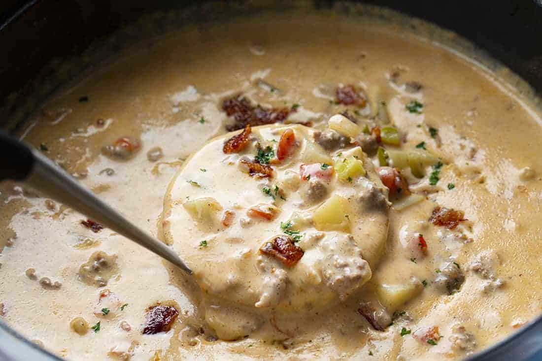 Creamy Cheeseburger Soup in Ladle