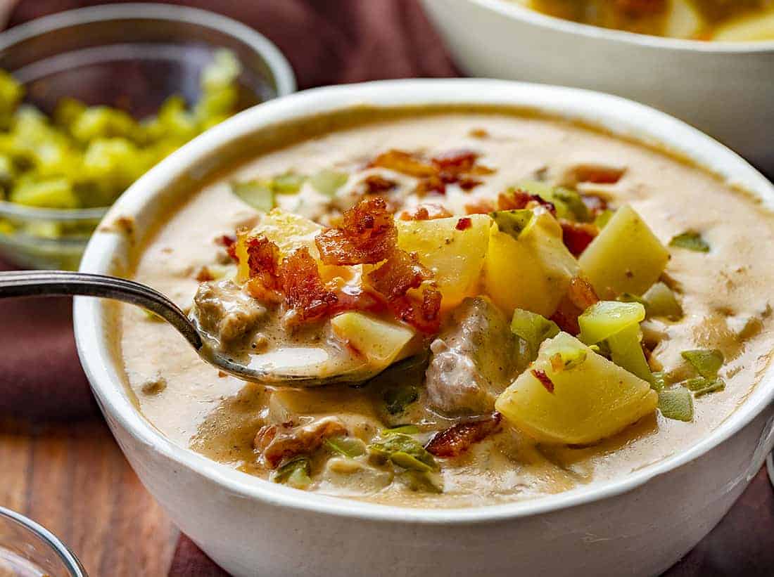 Spoon in Creamy Cheeseburger Soup 