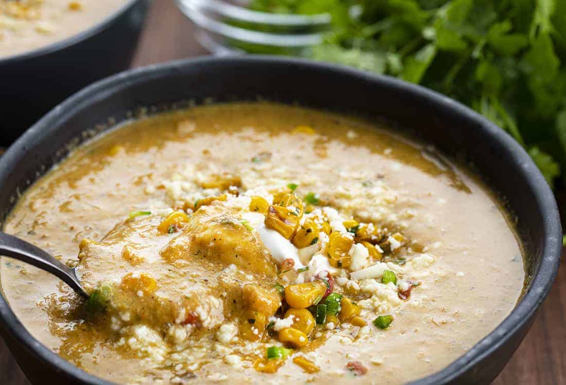 Bowl with Spoonful of Esquites Soup - Mexican Street Corn Soup Recipe