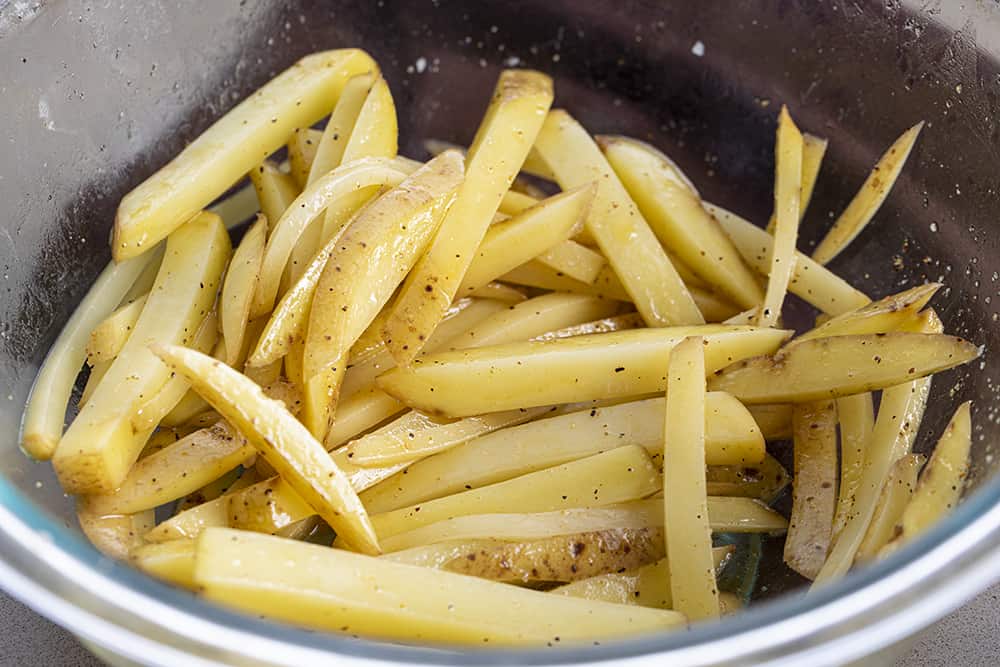 Raw Potato Strips Before Being Cooked into French Fries. Appetizer, French Fries, Air Fryer Recipes, How to Make French Fries, Side Dish, What to Serve with Burgers, i am homesteader, iamhomesteader