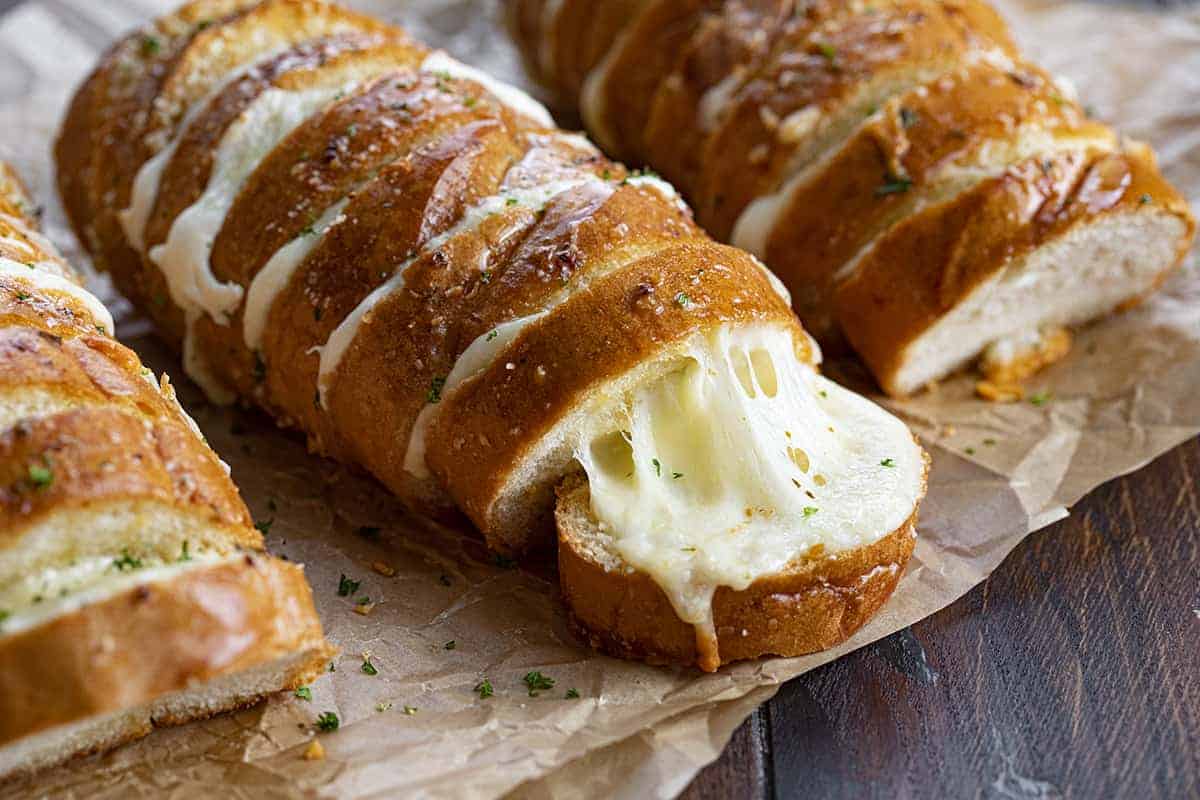 Hasselback Cheesy Bread on Parchment Paper