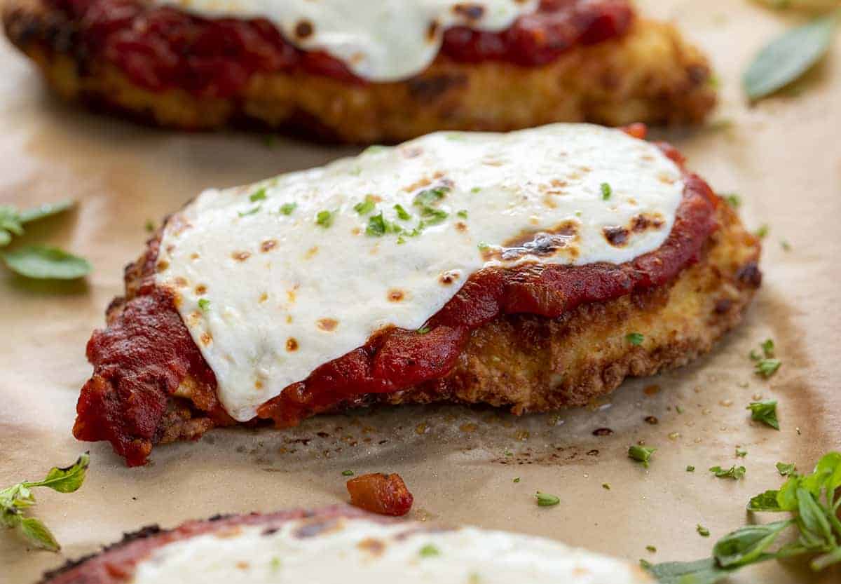 Piece of Crispy Chicken Parmesan on Parchment