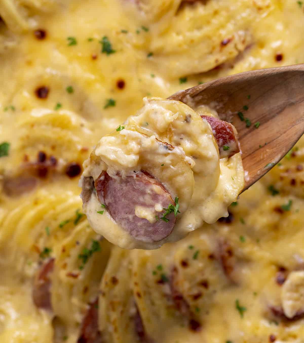 Spoonful of Potatoes Au Gratin with Smoked Sausage