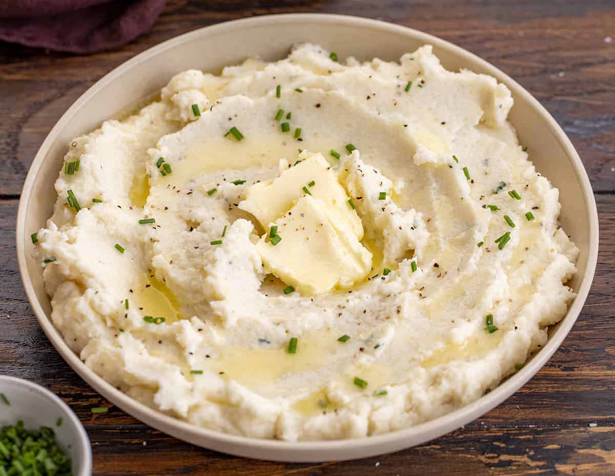 Bowl of Cauliflower Mashed Potatoes and Butter